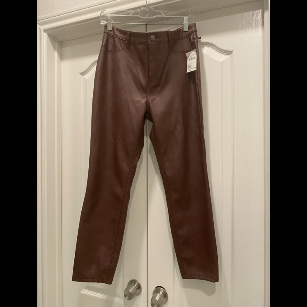 NWT faux leather burgundy pants, classic style, never worn!